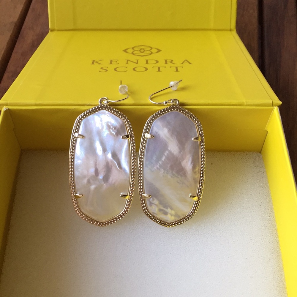 White Kendra scott earrings